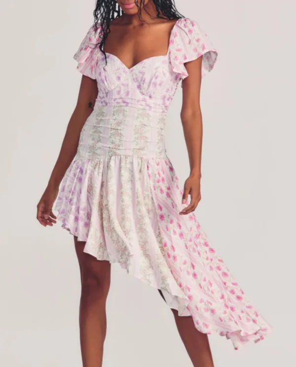 LOVE SHACK FANCY - Asymetryczna sukienka w kwiatowy wzór Irvine. Kwiaty Różowy / Fioletowy